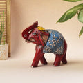 Red and blue handpainted elephant figurine