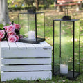 Set of 2 outdoor standing lanterns with candles