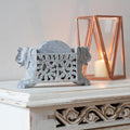 Elephant design marble coasters on mantlepiece