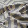 white and grey pattern dhurrie rug closeup